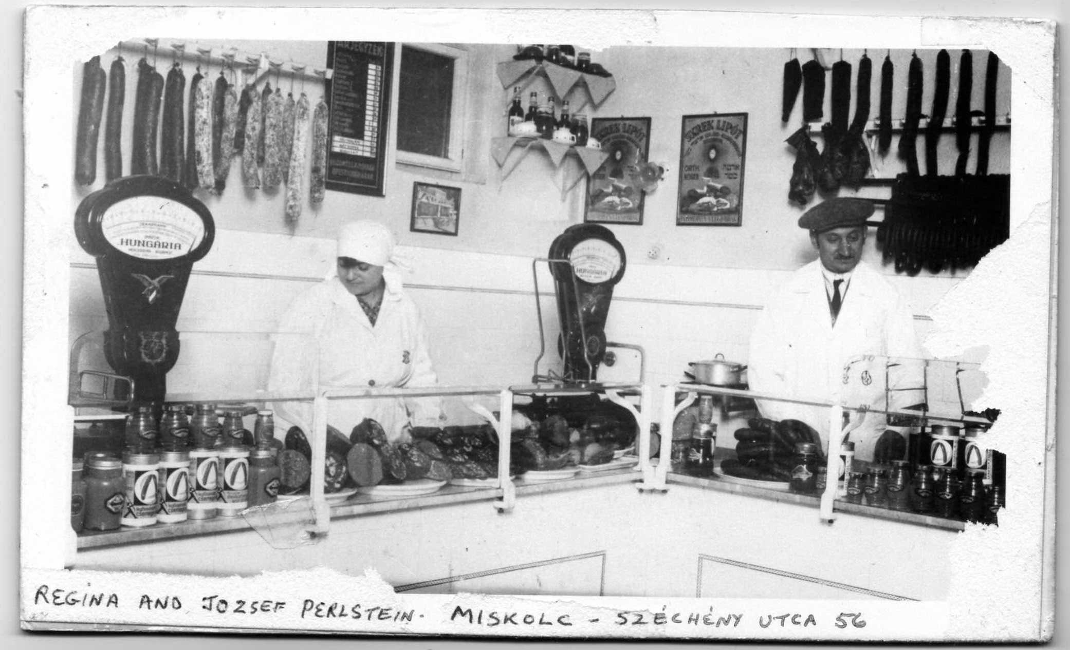 Magda Brown's parents, Regina and Jozsef Perlstein, in their butcher shop